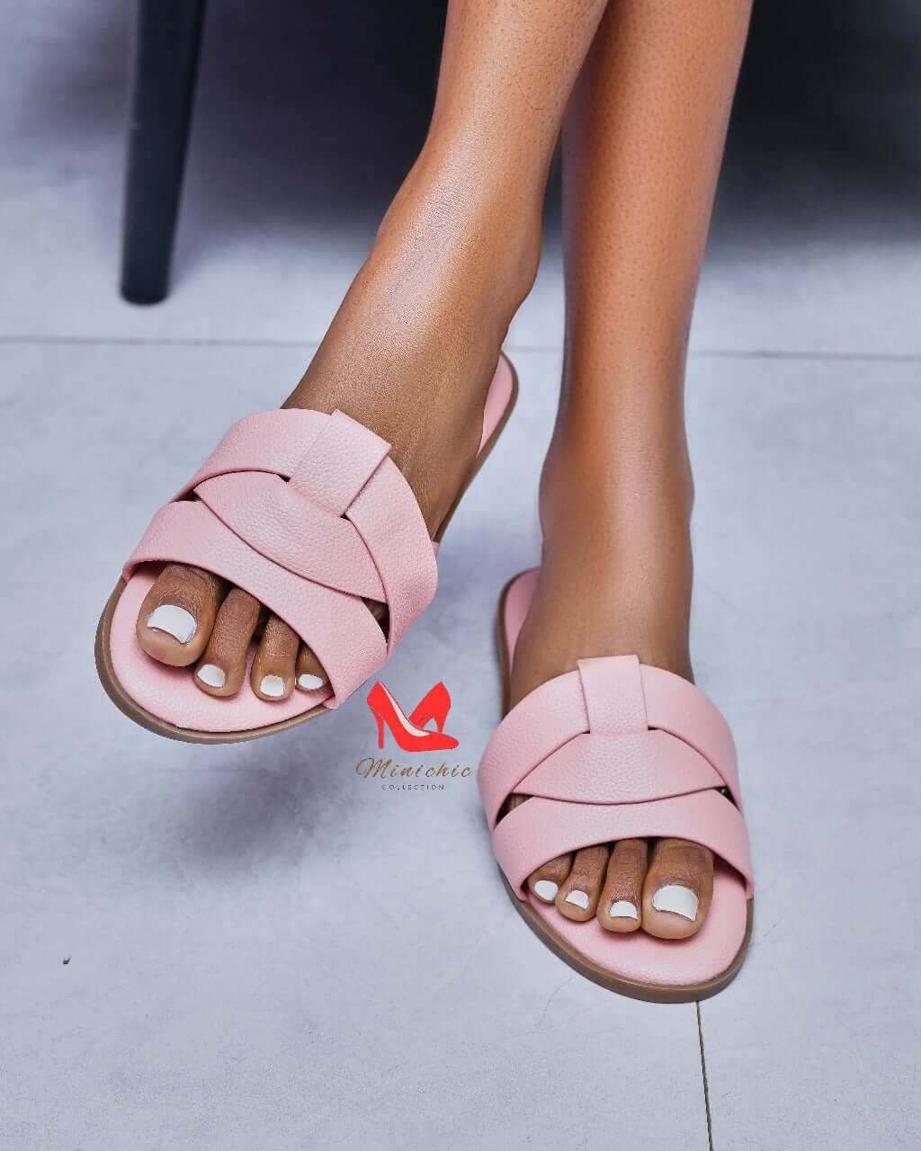 Stylish pink beach sandals seen from above, perfect for summer outings and casual wear.