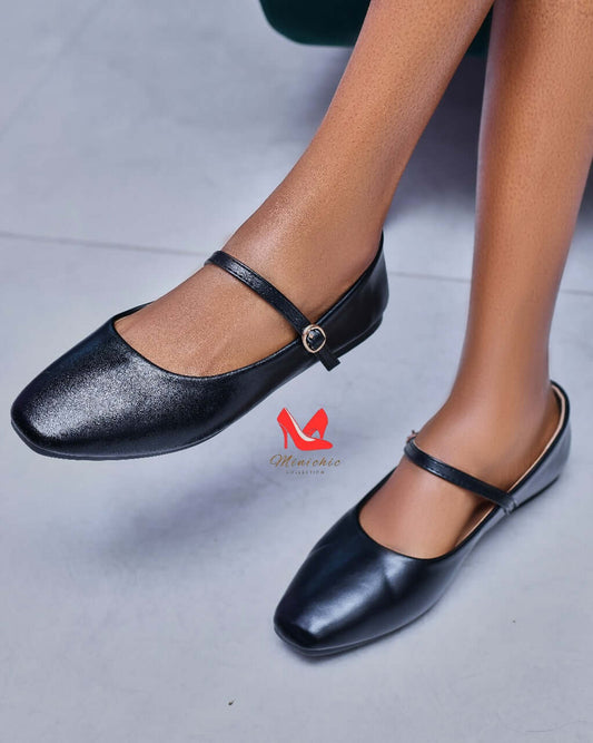 Elegant Ballerina Black shoes featuring a sleek design and stylish buckle strap, perfect for versatile outfits.